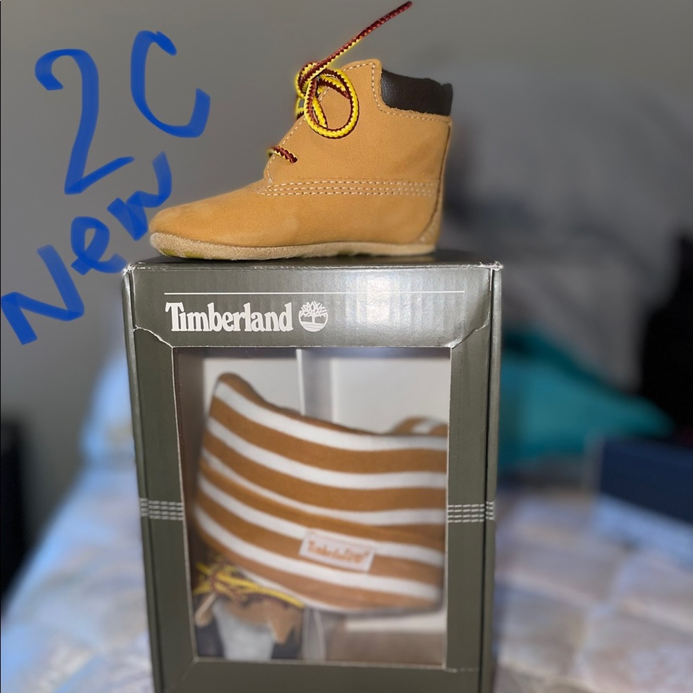Infant timberlands with beenie. Brand new in box.